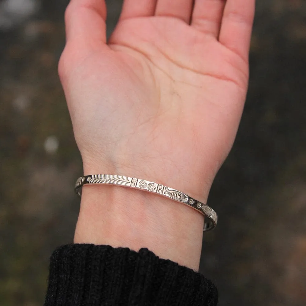 Stamped Fish and Fern Bangle