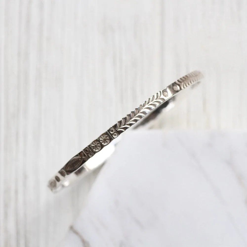 Stamped Fish and Fern Bangle