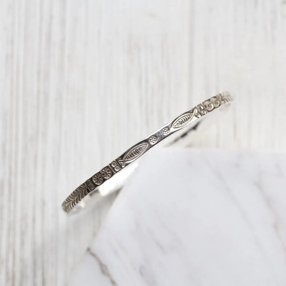 Stamped Fish and Fern Bangle